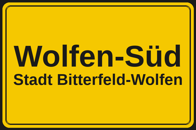 Ortsschild Wolfen-Süd in Bitterfeld-Wolfen – Hotels, Pensionen und Ferienwohnungen im Stadtteil