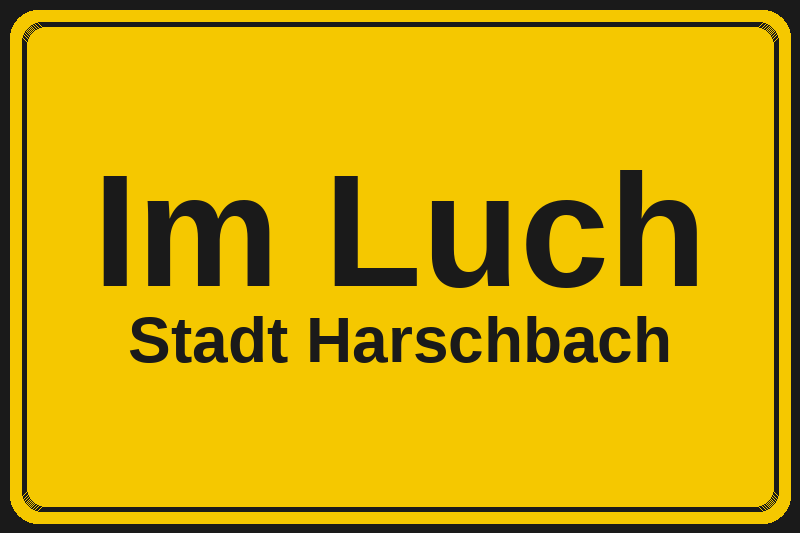 Ortsschild Im Luch in Harschbach – Hotels, Pensionen und Ferienwohnungen im Stadtteil